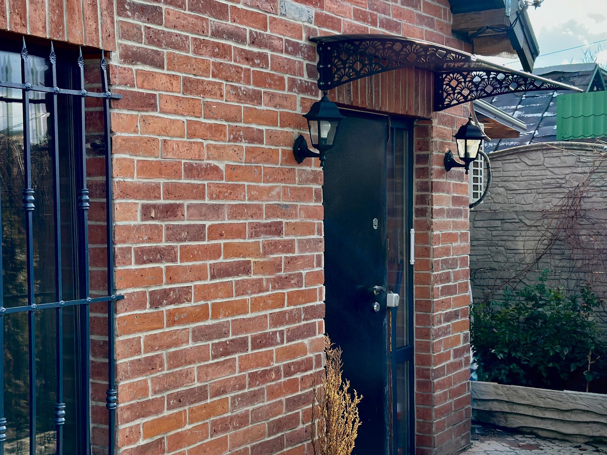 Door Awning with Decorative Metal Supports — 6