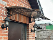 Metal Door Canopy with Grapevine Ornament