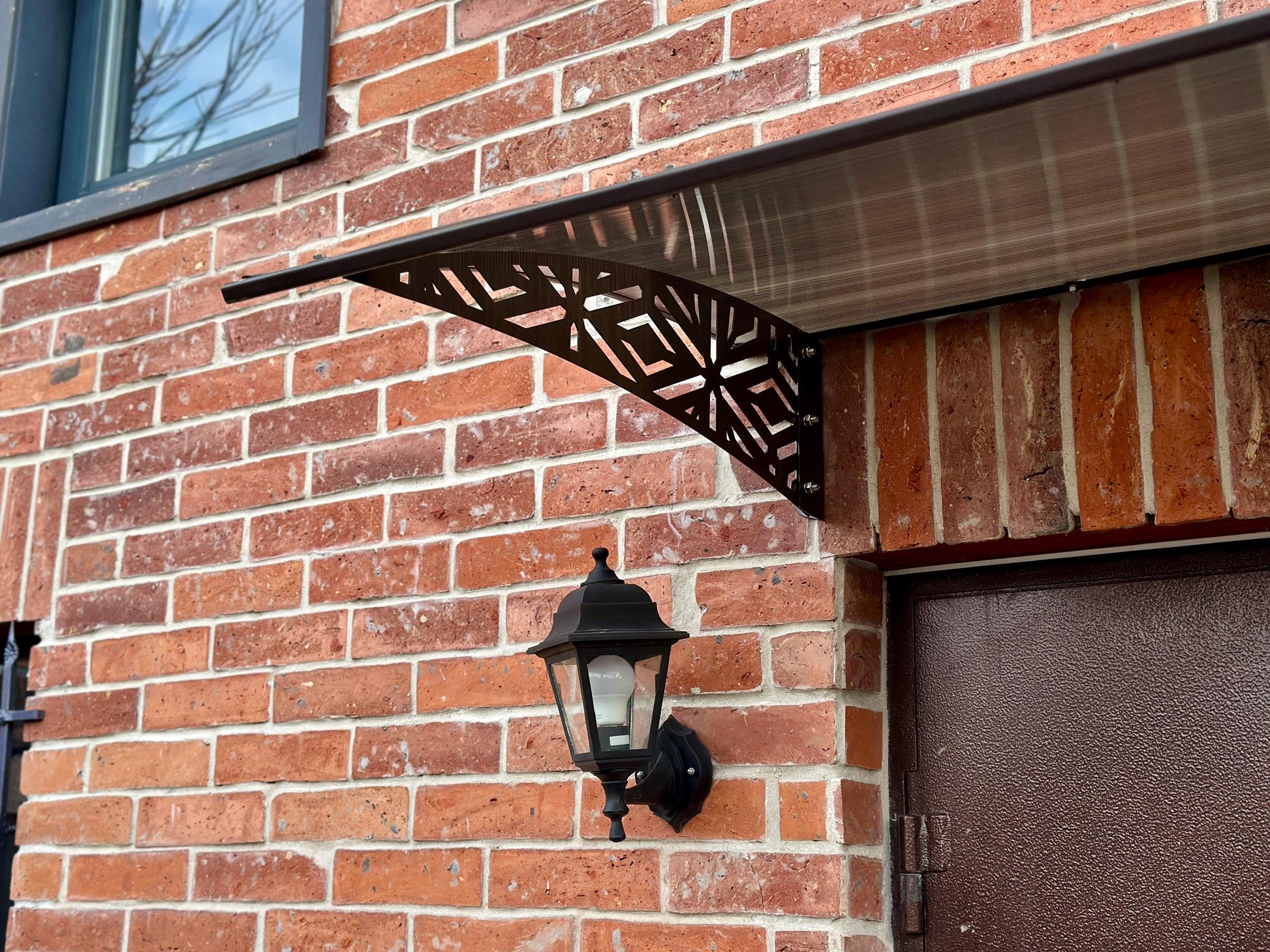 Metal Door Awning with Geometric Panels — 2