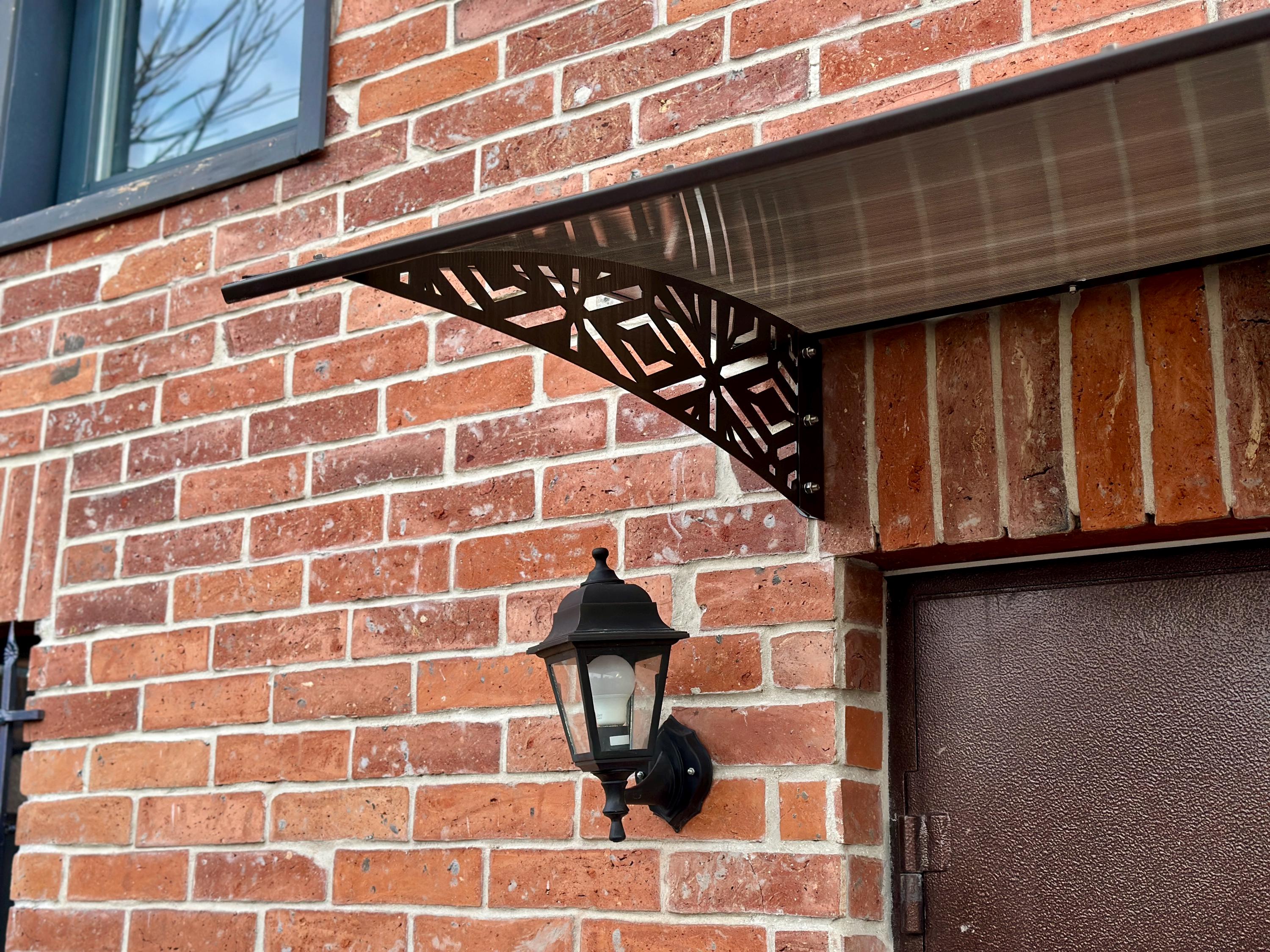 Metal Door Awning with Geometric Panels — 2