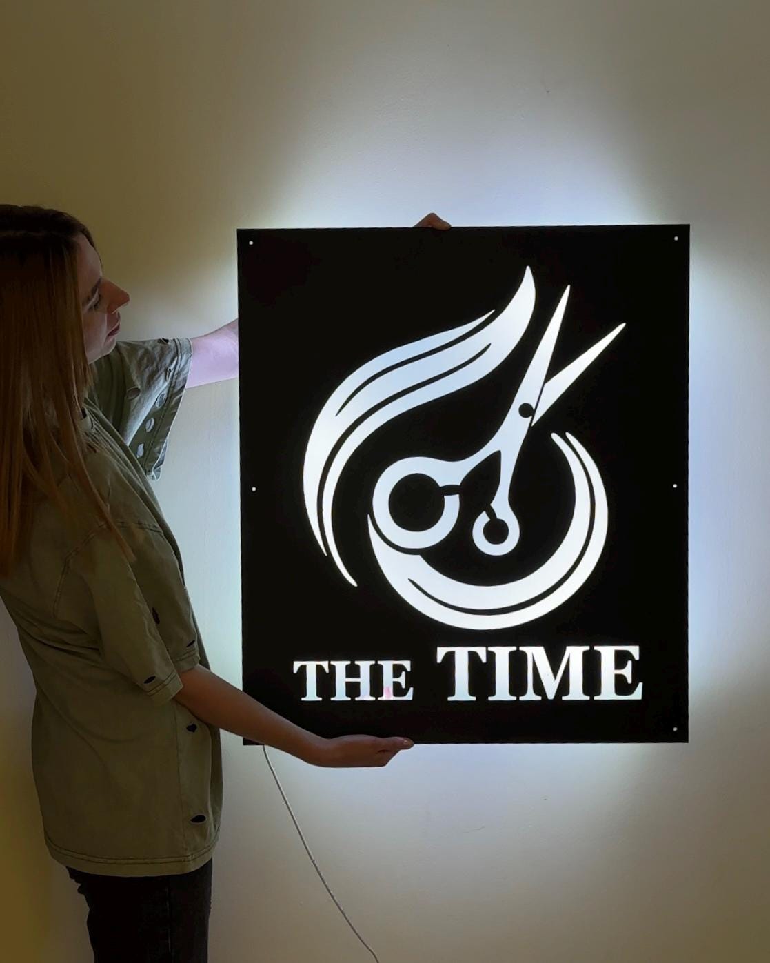 Custom designed LED signage made from metal in a rectangular shape